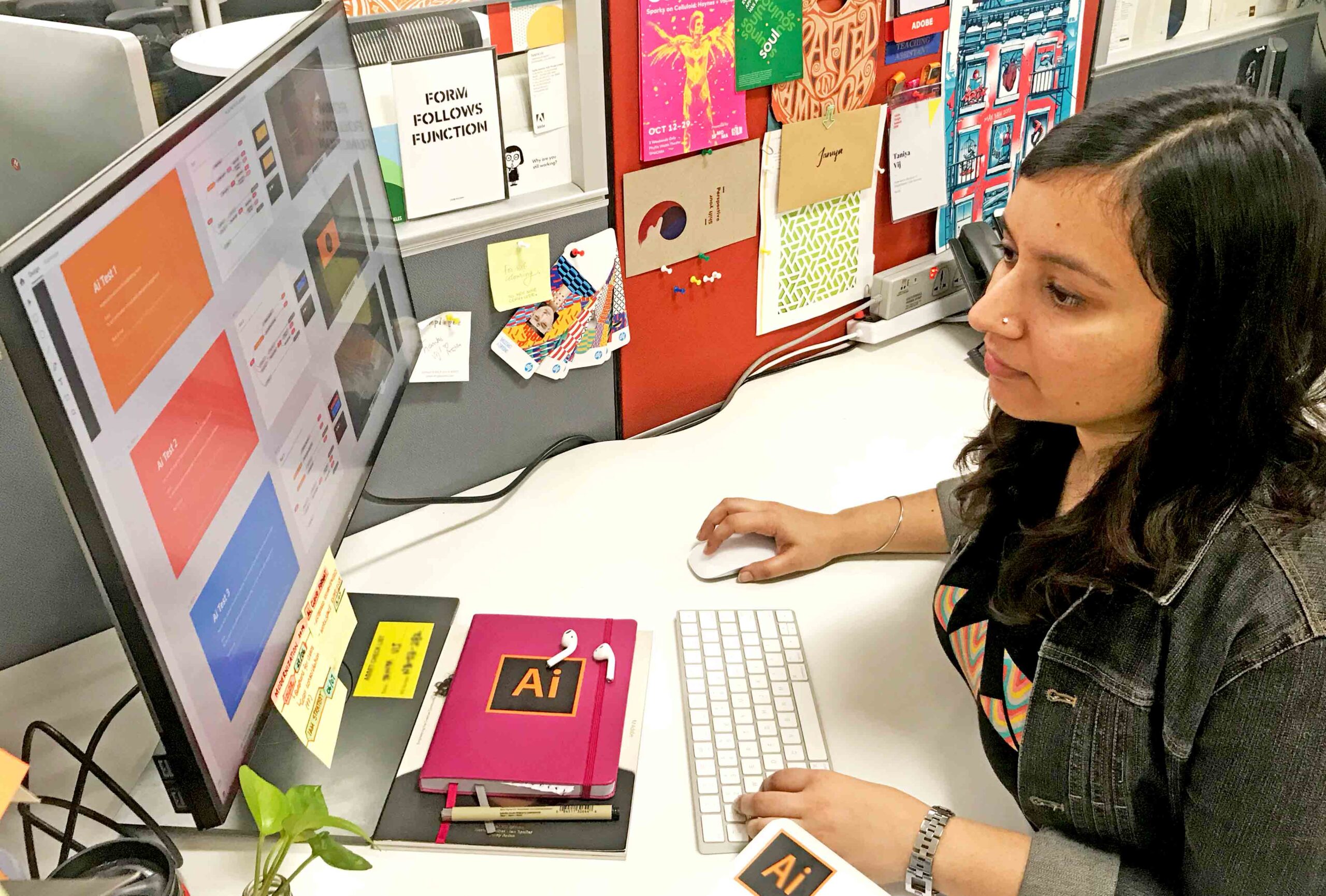 Taniya on her desk at work